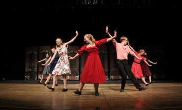 Dance for Musical Theatre class with selections from the musical La La land. Image depicts students doing a dance number.