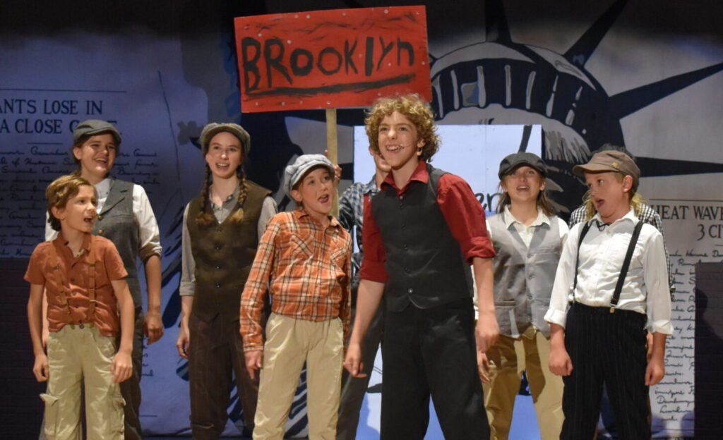Children performing in a musical